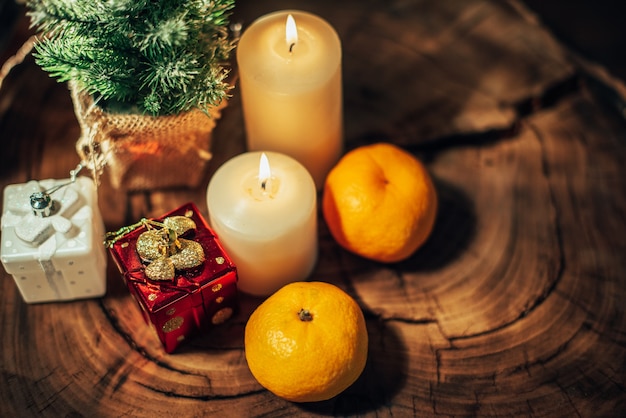 Christmas decor with candles and gifts