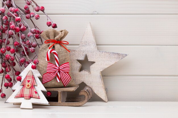 Christmas decor on the wooden white background