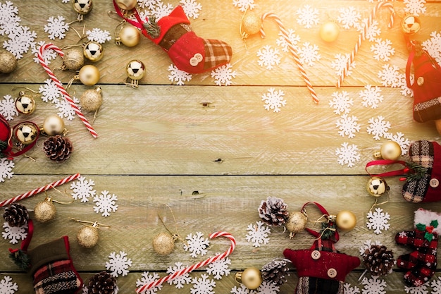 christmas decorating items on wooden background 