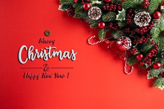 Photo christmas decoration background concept on red background.