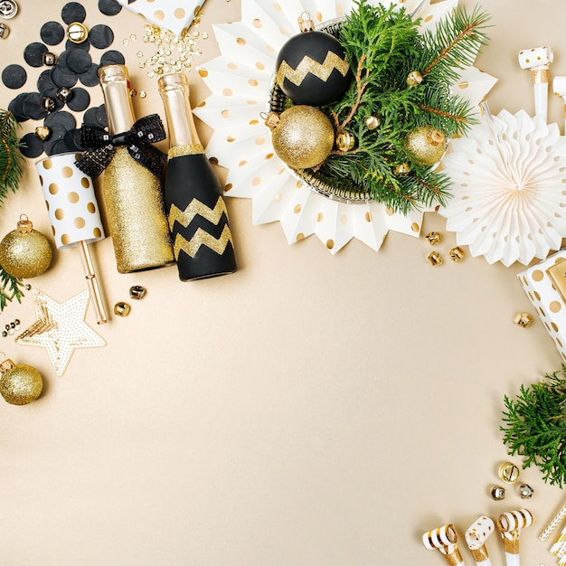 Christmas decoration background in golden and black colors. Flat lay, top view