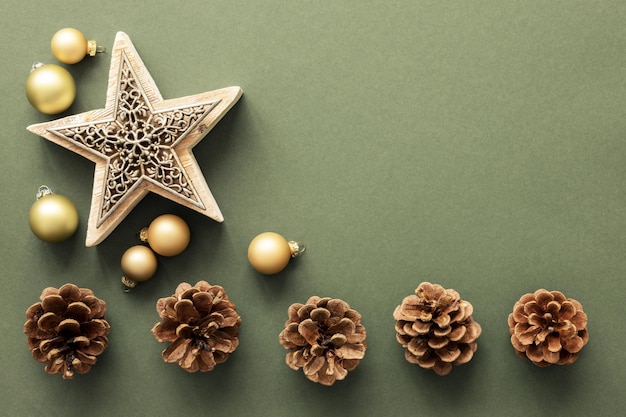 Christmas decoration background with pine cones and a star