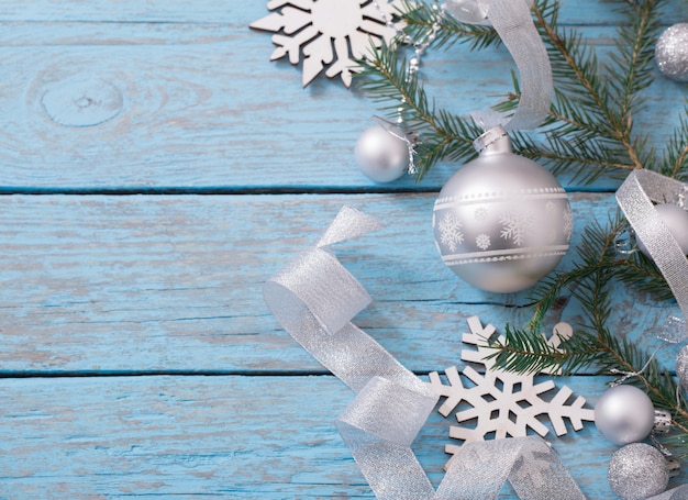 Christmas decoration on blue wooden background