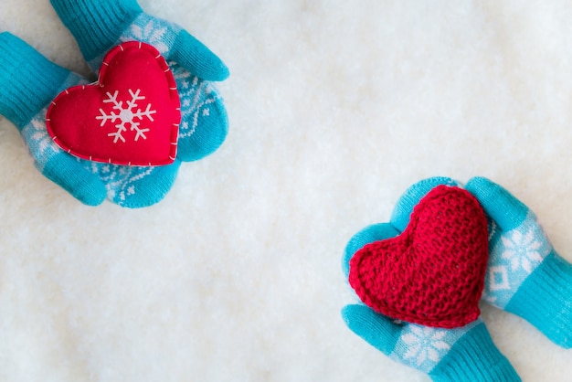 Christmas decoration in children hands on snow