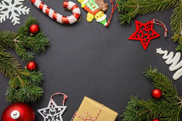 Christmas decoration flat lay on black background holiday\
decoration new year event preparation