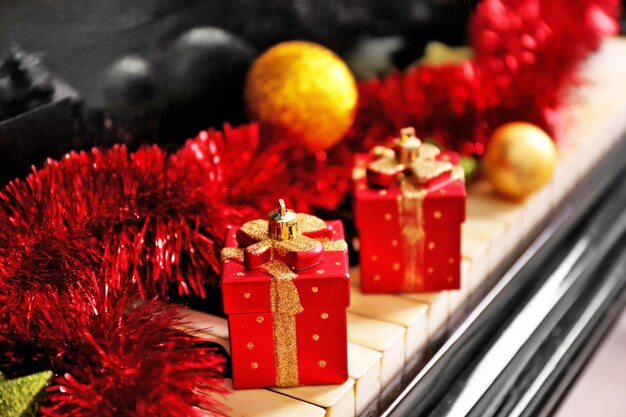 Christmas decoration on piano keys, closeup