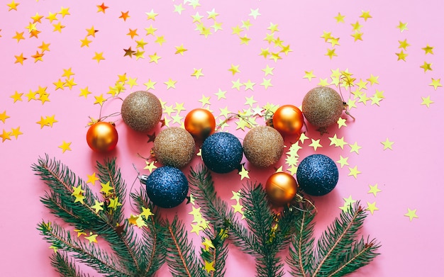 Photo christmas decoration on a pink background