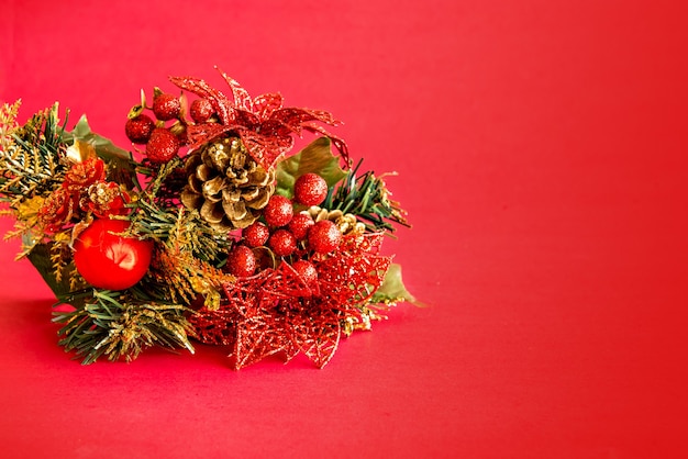 Christmas decoration on red background.