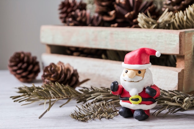 Christmas decoration of santa claus and pine cones