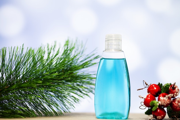 Christmas decoration and spa accessories on blue background