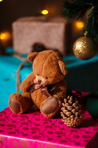 Christmas decoration, teddy bear and pine cone