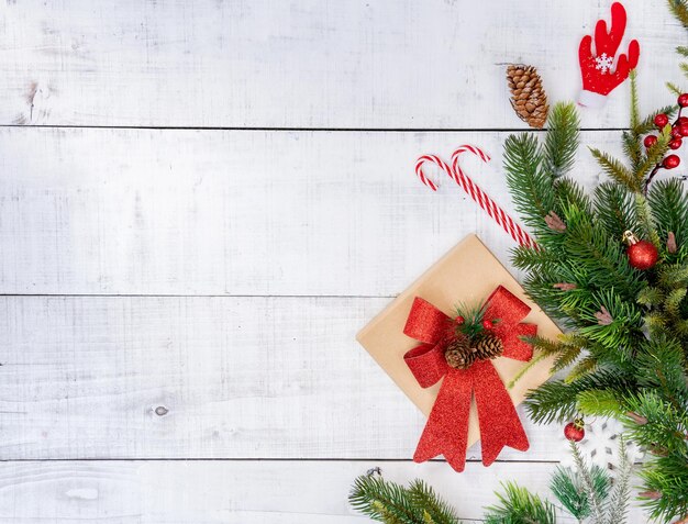 Christmas decoration on white wooden background with copy space.