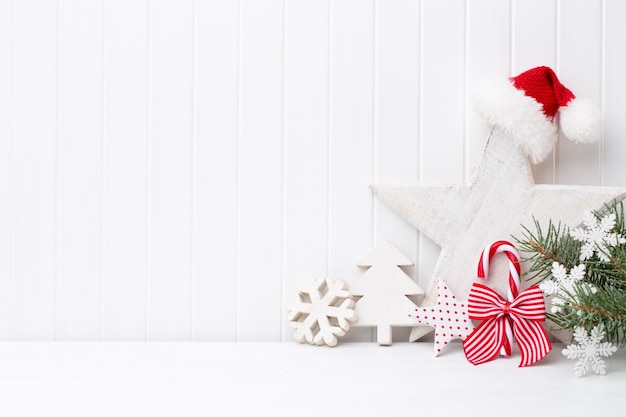 Christmas decoration on a white wooden surface.