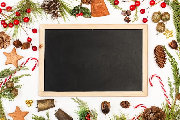 Christmas decoration with a blank blackboard