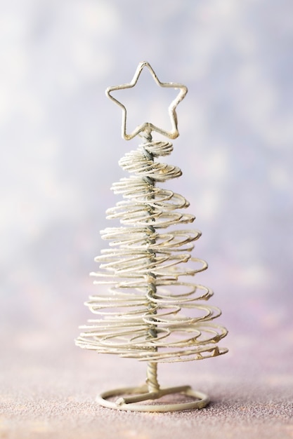 Christmas decoration with fir branches on the wood background.