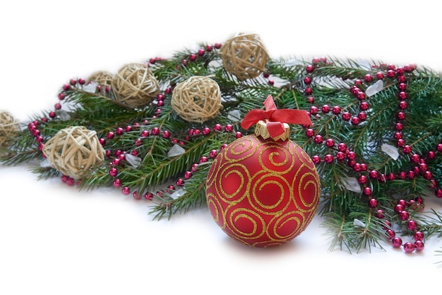 Christmas Decoration with red ball and green twig