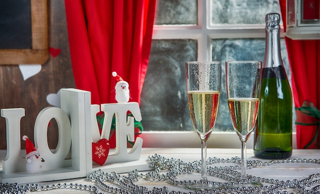 Christmas decoration with two glasses of champagne