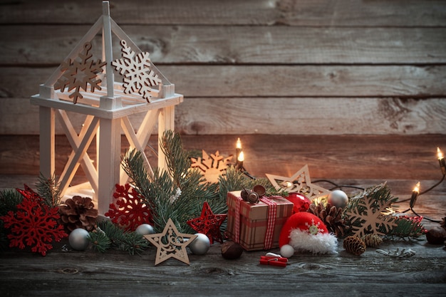 Christmas decoration with white lantern  on wooden background