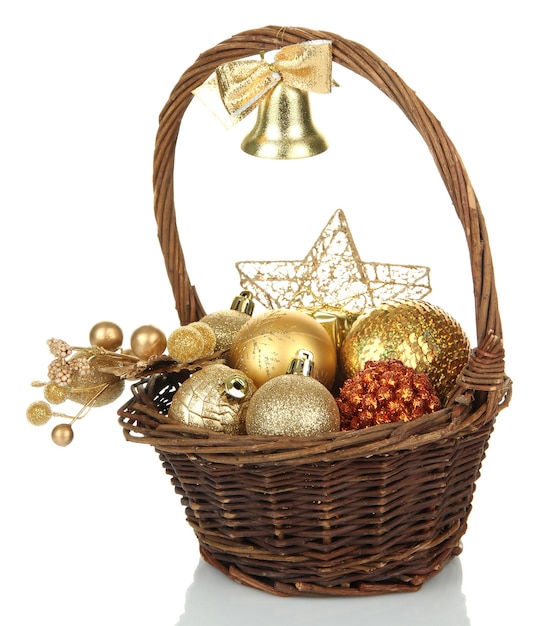 Christmas decorations in basket isolated on white