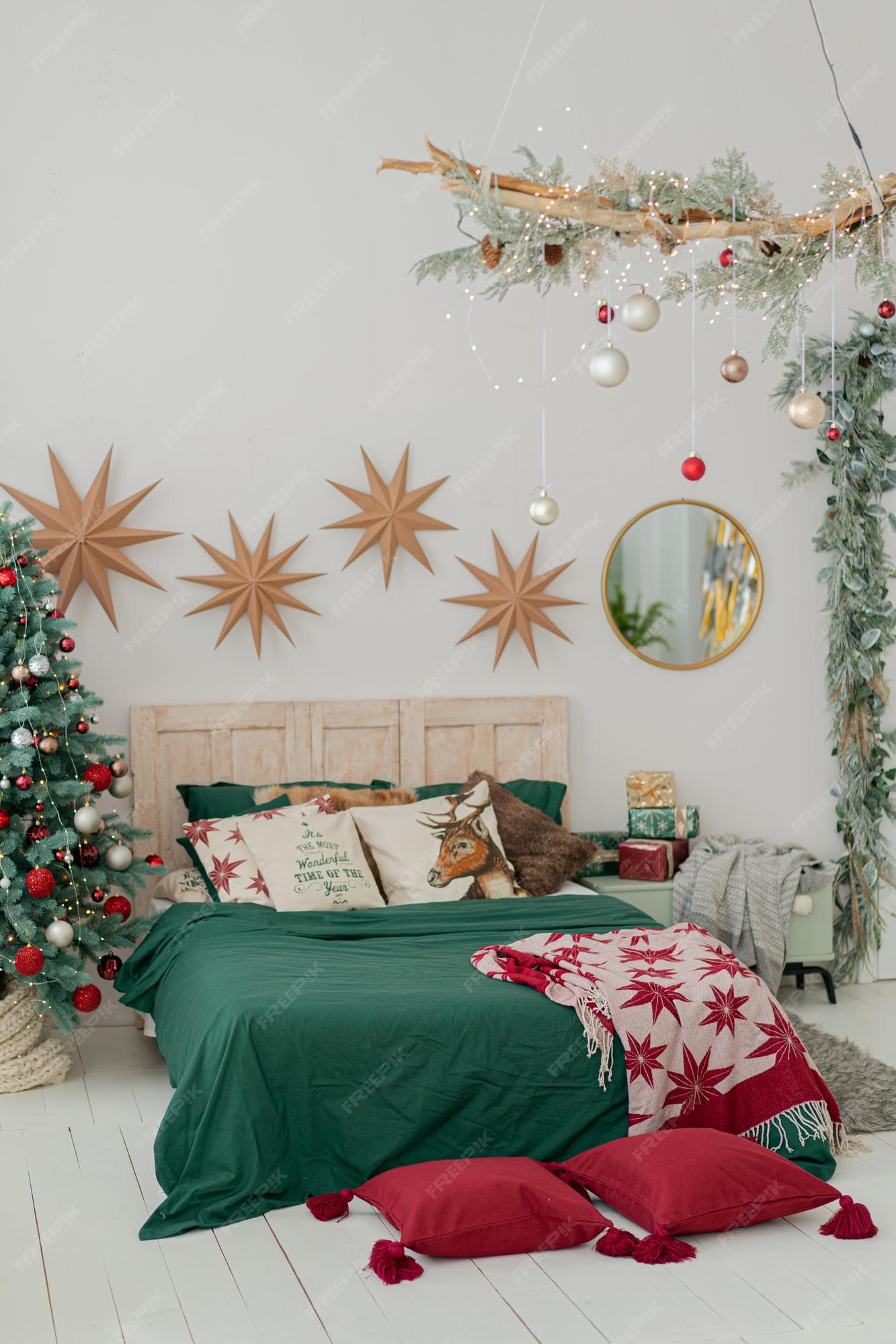 Premium Photo | Christmas decorations in bedroom in with tree ...