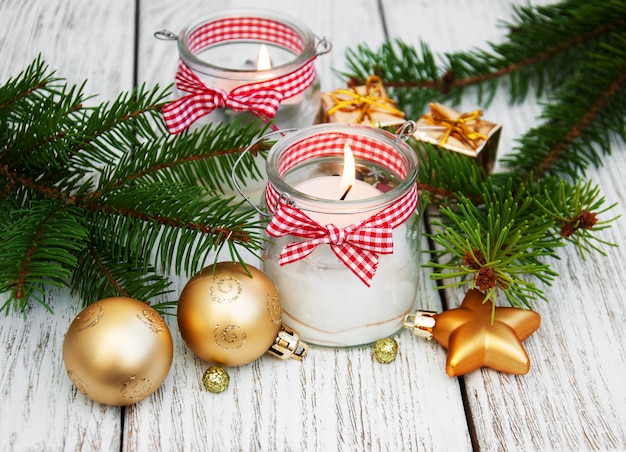  christmas decorations candles in glass jars with fir