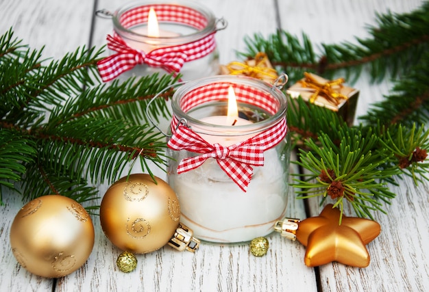  christmas decorations candles in glass jars with fir