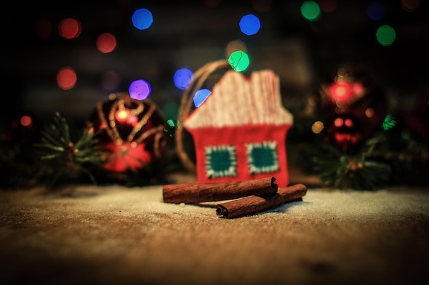 Photo christmas decorations and cinnamon sticks on a festive backgrou