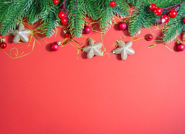 Christmas decorations concept Top view photo of gold and green baubles balls star ornaments confetti and pine branches on isolated white background with empty space