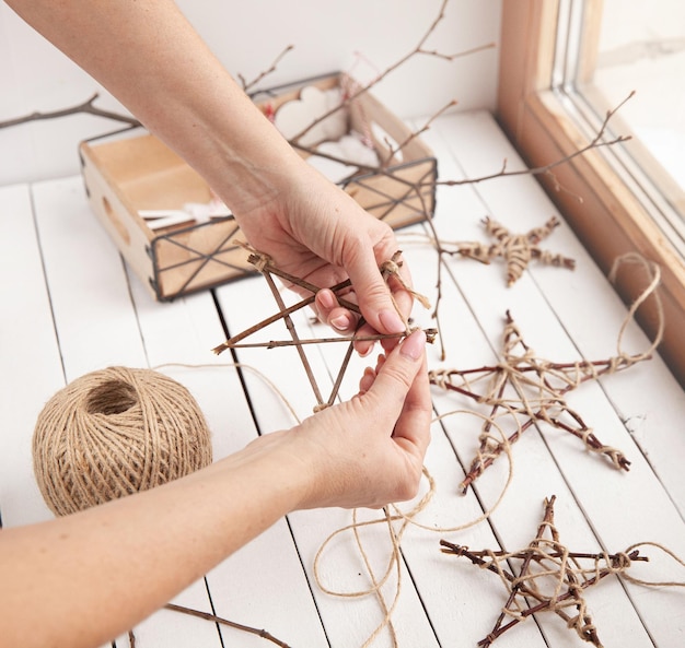 Christmas decorations from branches and jute rope Make stars with your own hands Master Class