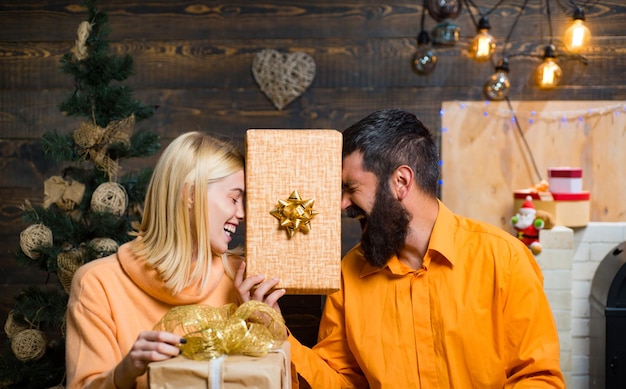 Christmas decorations and gift box on wooden background New year family with christmas present boxes