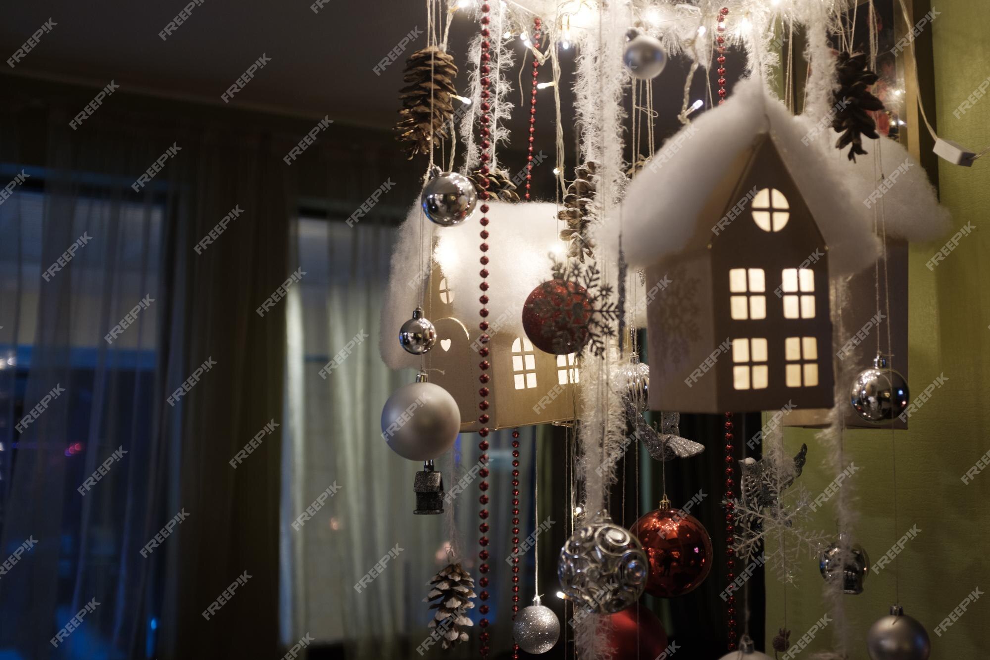 Premium Photo | Christmas decorations hanging in the country house ...