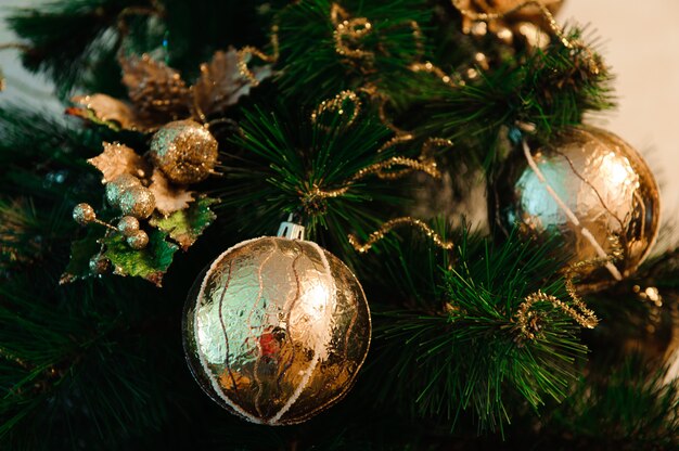 Christmas decorations hanging from the tree