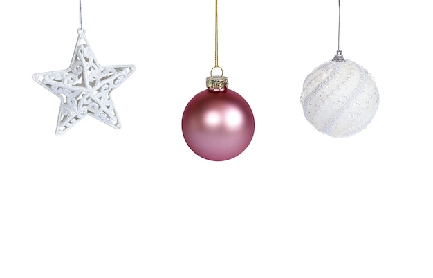 christmas decorations hanging on isolated white background closeup