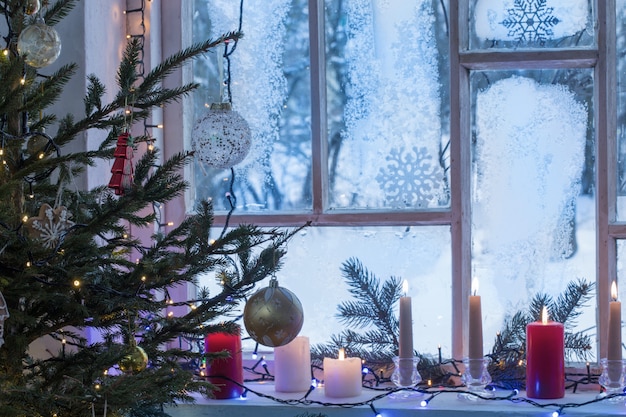 Christmas decorations on old wood window