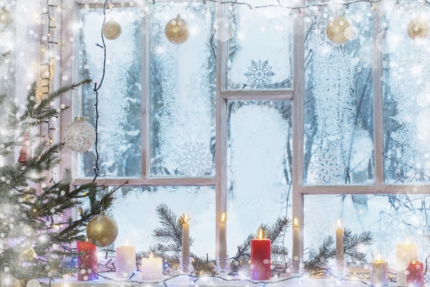 Christmas decorations on old wooden window