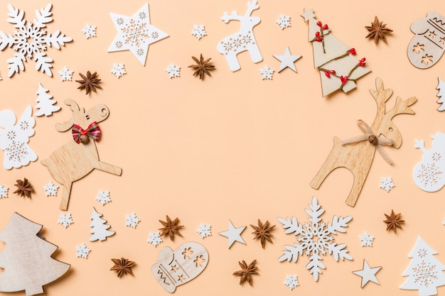 Christmas decorations on orange table