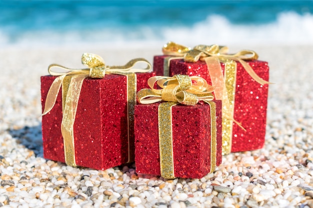 Christmas decorations in the sand on a beach