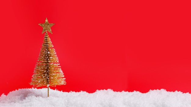 Christmas decorations on snow with red background copy spaceChristmas concept