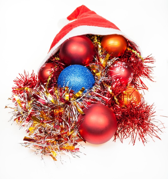 Christmas decorations spill out from red santa hat