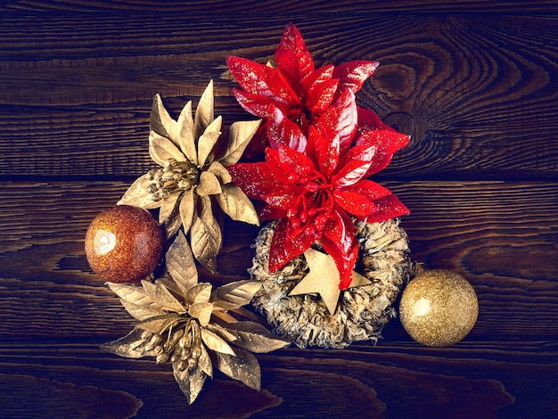 Christmas decorations Top view New Year decorations on a dark wooden background Closeup of garlands