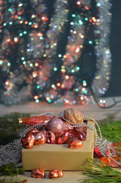 Christmas decorations and toys in a cardboard box