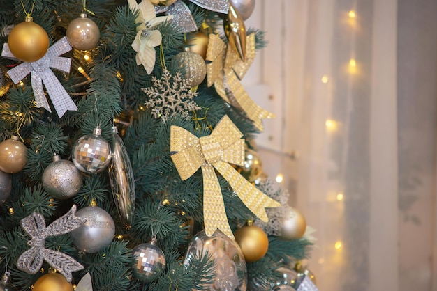 christmas decorations on the tree closeup balls garlands toys