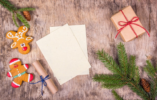 Christmas decorations with fir tree, gingerbread and gift box