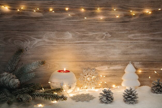 Christmas decorations with light garland and spruce