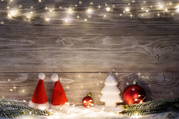 Christmas decorations with light garland and spruce