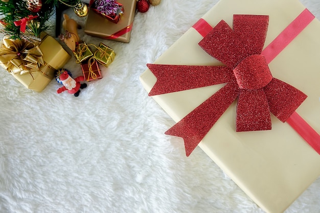 Christmas decorations with snow and red background.close up and selective focus.