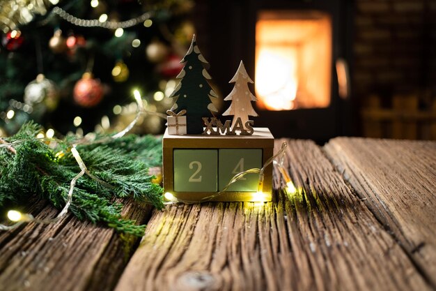 Christmas decorations on wooden background fireplace