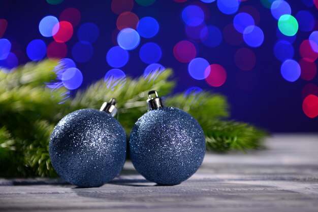 Christmas decorations  on wooden table, on bright background