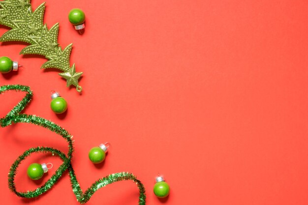 Christmas decorative objects with green tinsel and small balls