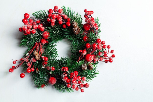 Christmas decorative wreath of holly, ivy, mistletoe, cedar and leyland leaf sprigs 